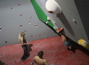Climber on bouldering wall