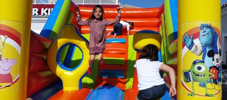 Kids on inflatable play structure