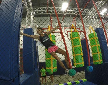 Girl on Ninja Warrior Course