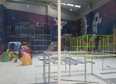 Installing a commercial indoor playground structure