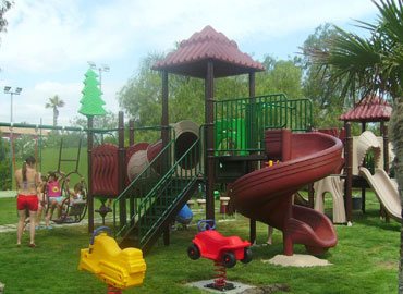 Installed commercial outdoor playground structure