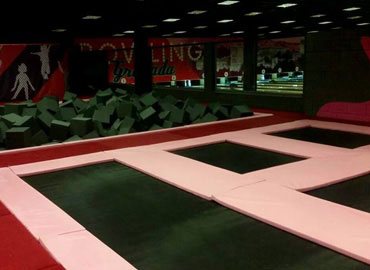 Trampoline park installed with climbing wall