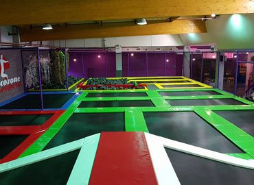 Trampoline park main area with trampolines